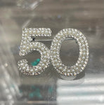 50 brooch