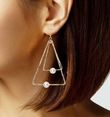 Gold dangling triangle pearl earrings