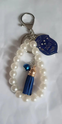 Zeta shield pearl wristlet keychain