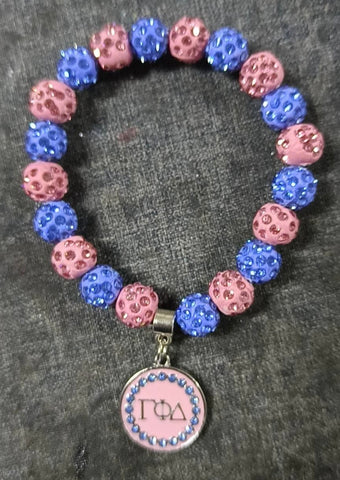 Gamma beaded bracelet with coin