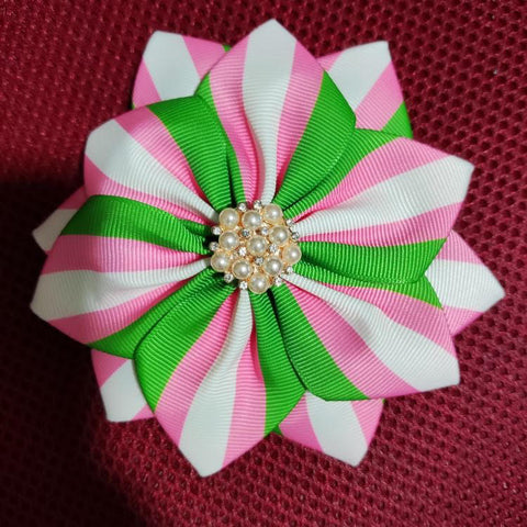 Pink, green and white pinwheel corsage