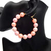 Pink pearl hoop earrings